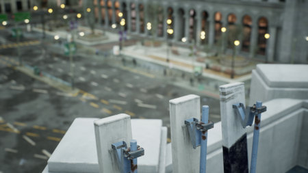 Workers secure metal beams atop a high rise structure as the vibrant city thrives beneath. The bustling streets showcase a lively urban environment filled with energy and activity.の写真素材