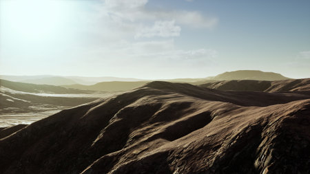 A vast landscape showcases gently rolling hills bathed in soft sunlight, creating a peaceful and...