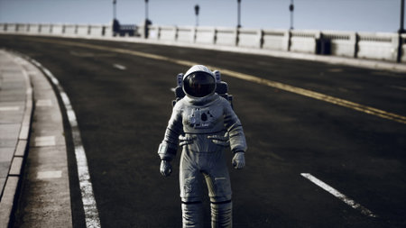 A lone astronaut stands on a deserted road, gazing at the horizon. The sun shines brightly in the background, creating a dreamlike atmosphere. The scene evokes a sense of wonder and adventure.の写真素材