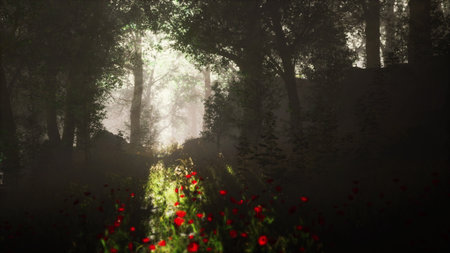In a tranquil forest, rays of sunlight pierce through dense tree canopies, illuminating a softly winding path. A carpet of vibrant wildflowers adds warmth to the peaceful atmosphere.の写真素材