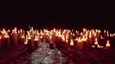Soft light from numerous candles flickers in a shadowy space, casting warm glows. The scene radiates tranquility and mystery, inviting contemplation and calmness.の写真素材
