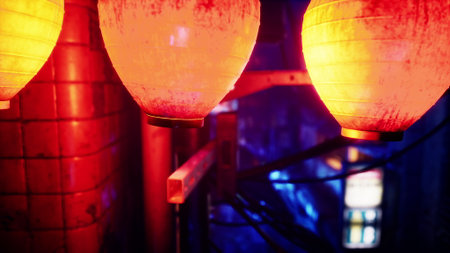 Lanterns hang low in a bustling alley, casting warm light amid a backdrop of deep blues and lively urban scenery. The atmosphere is alive with excitement and creativity.の写真素材