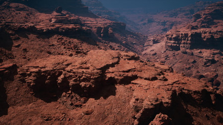 Majestic canyon terrain stretches across the horizon, showcasing deep red rock formations and...