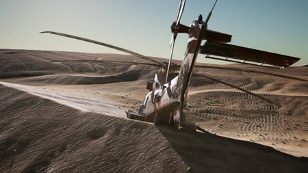 A weathered helicopter lies stranded on sunlit sand dunes, casting a long shadow. The vast desert stretches beyond, with rippled patterns in the golden sand under a clear sky.の写真素材