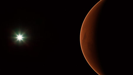 A breathtaking view captures a red planet softly lit by a nearby bright star. The scene presents a cosmic dance of celestial bodies against the dark backdrop of space.の写真素材