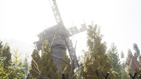 Nestled in a serene forest, an old wooden windmill captures the sunlight. The greenery surrounds it,...