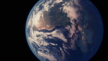 A breathtaking view of Earth from space reveals the beauty of natural landscapes and twinkling city lights. The image displays the planets diverse features, from mountains to oceans.の写真素材