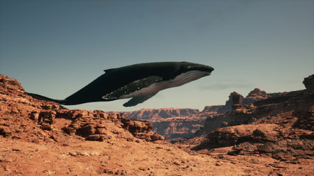 A humpback whale glides majestically above a stunning red rock canyon. The clear blue sky highlights the surreal beauty of this vibrant landscape. Nature and imagination come together skillfully.の写真素材