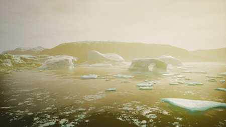 Glacial icebergs drift serenely in tranquil waters under soft dawn light. Snow capped mountains rise in the background, creating a peaceful, natural landscape that evokes wonder.の写真素材