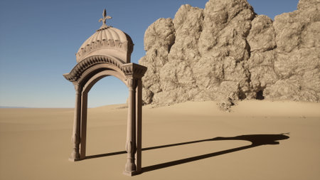 In the vast desert, a beautiful archway stands surrounded by golden sands and rocky formations. The structure casts a long shadow, creating a striking contrast against the blue sky.の写真素材