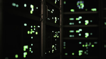 In a dark data center, vibrant green digital signals shine against the backdrop of sleek black...