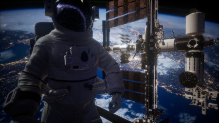 An astronaut floats in the vastness of space, gear gleaming under the sunlight. The International Space Station looms majestically in the background, surrounded by Earthâs beauty at night.の写真素材