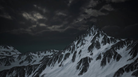 A breathtaking mountain peak stands tall against the night sky, bathed in soft moonlight. Dark clouds swirl above, creating a moody atmosphere that enhances the raw beauty of nature.の写真素材