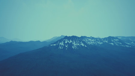 Breathtaking mountain ranges stretch across the horizon. Snow covered peaks glisten in the soft sunlight, creating a serene and tranquil landscape. Natures beauty captivates all who behold it.の写真素材