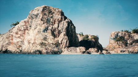 Majestic cliffs rise dramatically from the serene blue sea, surrounded by lush greenery. The sun shines brightly, creating a perfect day for exploration and relaxation by the shore.の写真素材