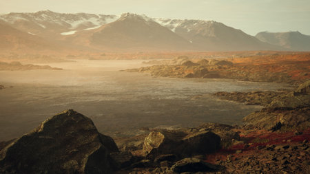 Amidst a breathtaking landscape, mountains rise majestically, their peaks dusted with snow. The calm waters mirror the stunning scenery under the soft light of dusk, creating a peaceful atmosphere.の写真素材