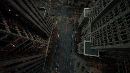 The scene captures a stunning aerial view of a busy urban landscape at dusk. Skyscrapers loom overhead, their lights just beginning to glow as cars traverse the city streets below.の写真素材