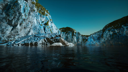 A beautiful landscape features calm water mirroring jagged rock formations under a tranquil twilight...