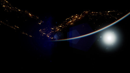 High above the planet, a breathtaking view reveals city lights twinkling along a coastline. The curve of the Earth is visible alongside beautiful celestial elements, creating a captivating spectacle.の写真素材