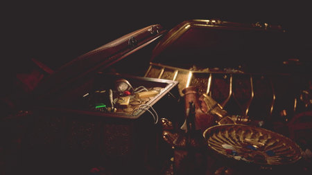 A treasure chest partially open, showcasing shimmering gold coins, ancient artifacts, and mysterious...