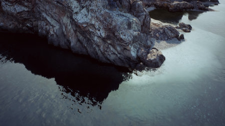 An impressive view of a rocky beach and water captured from above in Portugal.の写真素材