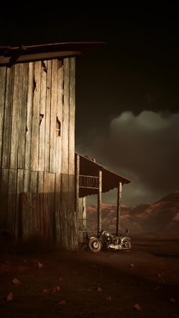 A motorcycle is parked in front of a rustic barn in a rural setting.の写真素材