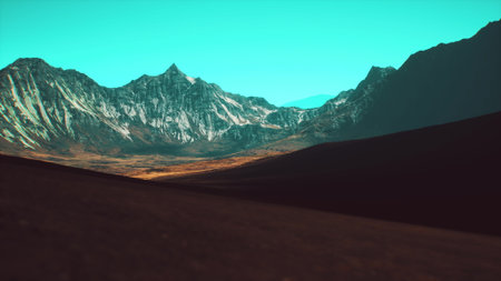 The sun sets behind towering mountain peaks, casting shadows on the valley below, while a brilliant...