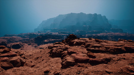 Delight in the captivating beauty of a crimson-hued stone canyon, adorned with a rugged rocky outcropping and an awe-inspiring mountain as its majestic backdrop.の写真素材