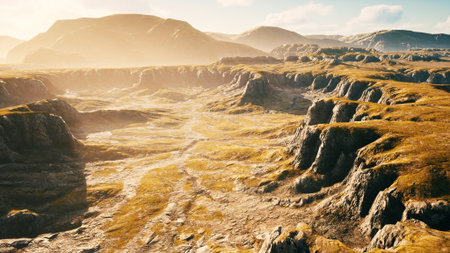 Landscape with mountains and dry yellow grass in New Zealandの写真素材