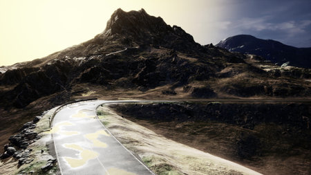 A winding road stretches through a rugged mountain terrain, illuminated by a bright sun. The scenery...