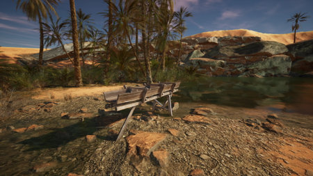A rustic wooden bench rests on the shore of a tranquil oasis, with towering palm trees and warm desert sands in the background, showcasing the beauty of nature and serenity.の写真素材