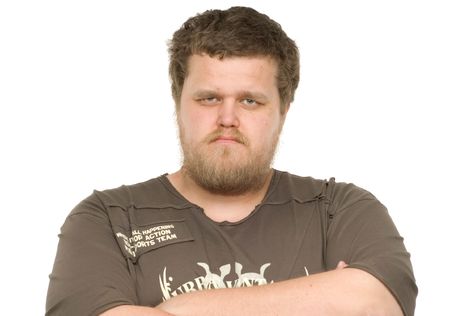 Portrait of hairy man before white backgroundの写真素材