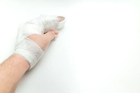 dislocated finger on white backgroundの写真素材
