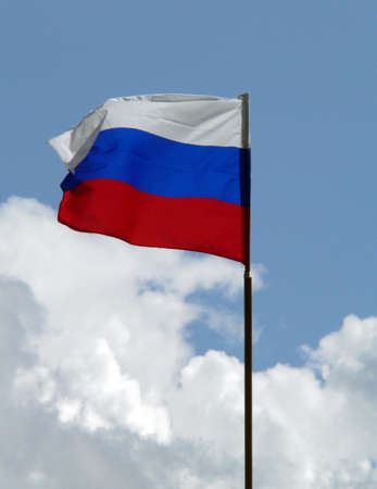 Russian flag on sky backgroundの写真素材