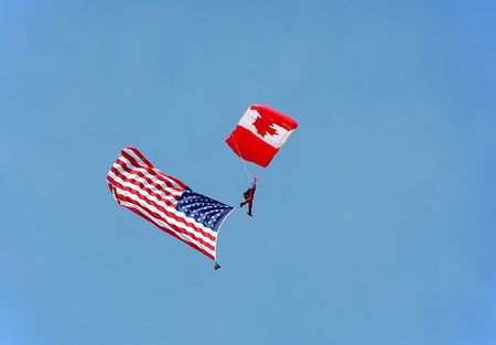 Canadian parachutist with US flagの写真素材