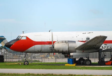 Old charter airplane abandoned at airport