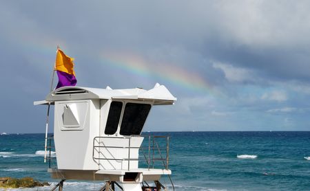 Lifeguard tower and rainbowの写真素材
