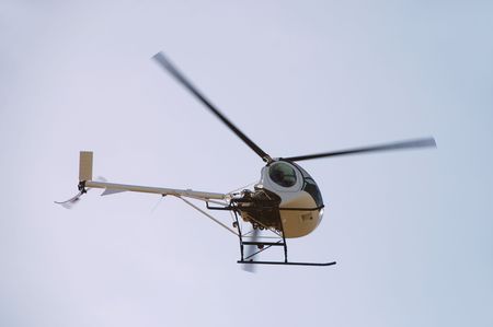 Light private helicopter in flight                                の写真素材