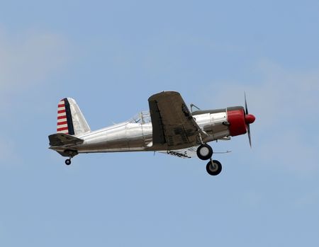 Retro propeller airplane in flight