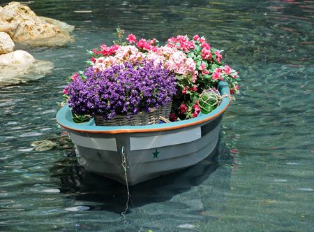 Old wooden boat used fopr flower bedの写真素材
