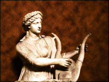 Ancient statue of woman playing the harpの写真素材