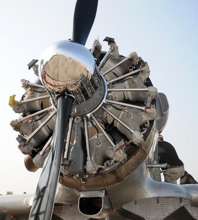 Retro propeller airplane nose and radial engine view