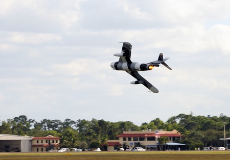 Old military jet airplane taking off