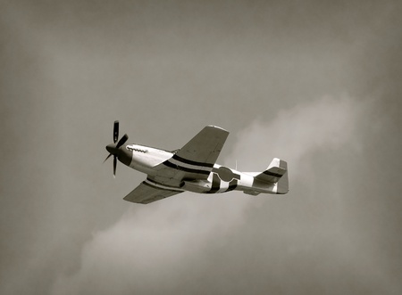 World War II era fighter plane in flightのeditorial素材