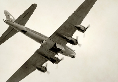 World War II era bomber flying with bomb bay openのeditorial素材
