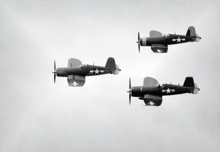 World War II era Navy fight airplanes in formationのeditorial素材