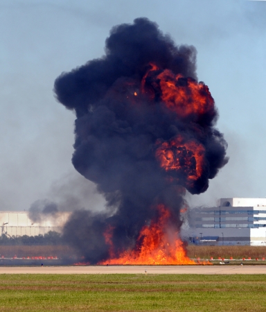 Giant outdoor explosion with flames and smokeの写真素材