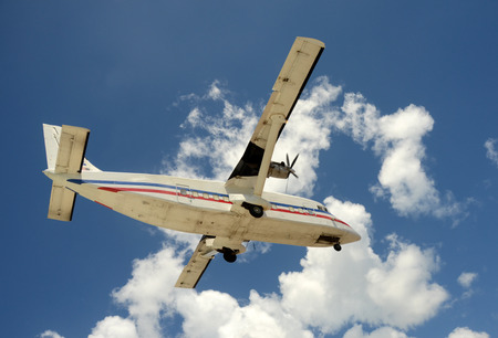 Modern turboprop airplane transporting cargo closeup view