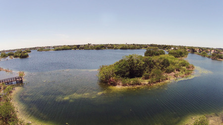 Lake and lakefront park in Florida aerial viewの写真素材