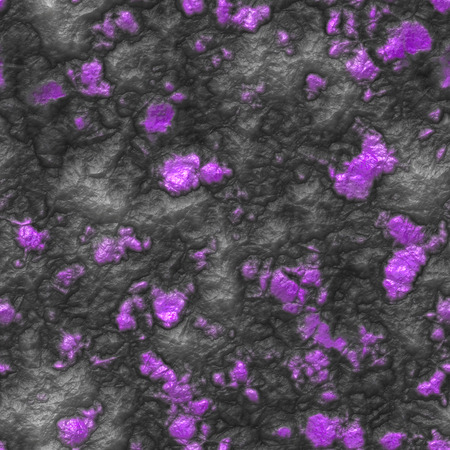 Purple colored minerals mixed in black lavaの写真素材